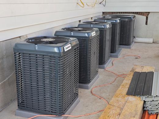 Row of AC condensers installed by MJM in central NJ